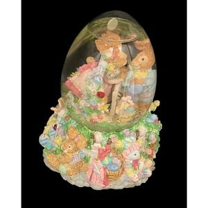 Easter Bunny Musical Snow Globe plays "Here Comes Peter Cottontail"